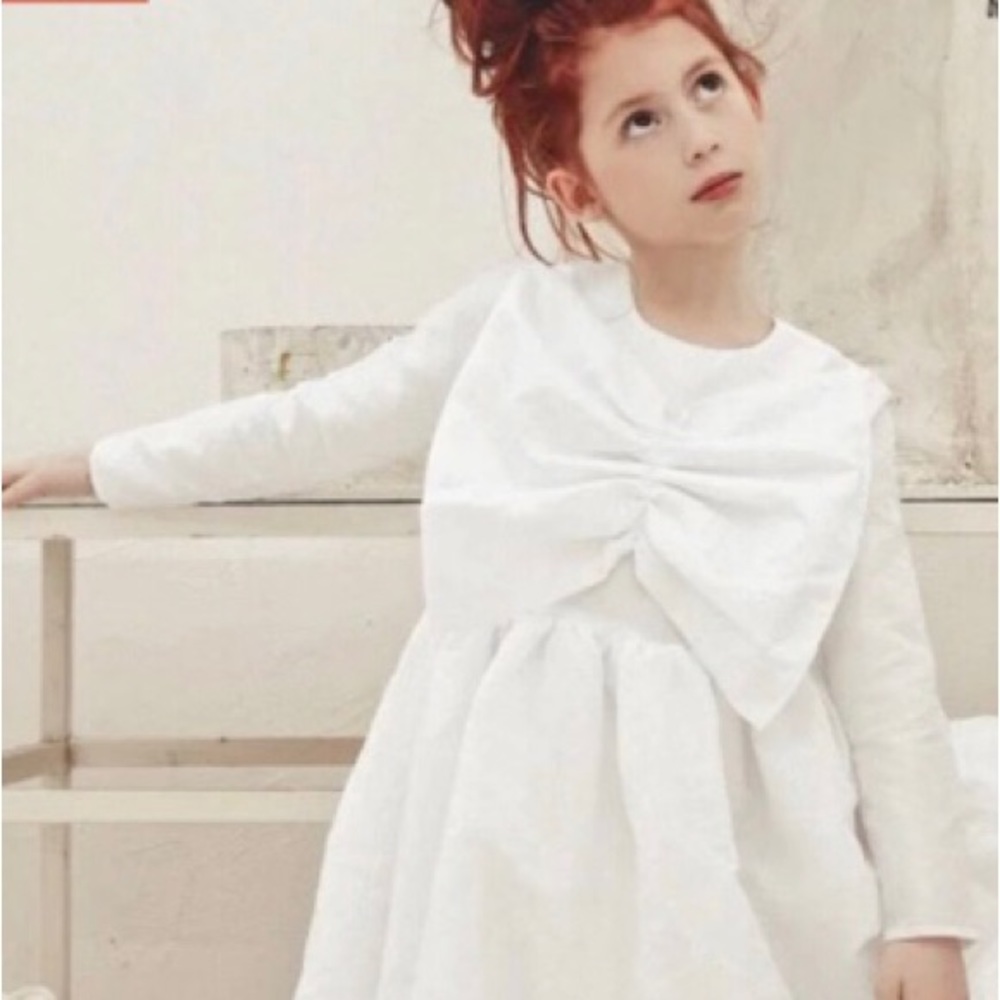 Gorgeous ivory dress with large bow
